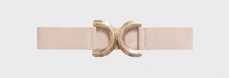 Beige belt with a gold buckle on a white background
